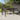 Tuintafel 190x90x75 cm gehard glas en poly rattan bruin