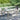 Tuintafel 190x90x75 cm gehard glas en poly rattan grijs