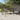 Tuintafel 190x90x75 cm gehard glas en poly rattan grijs