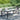 Tuintafel 250x100x75 cm gehard glas en poly rattan zwart
