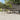 Tuintafel 250x100x75 cm gehard glas en poly rattan beige