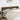 Hoofdbord met randen 203x23x78/88 cm stof donkerbruin