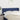 Hoofdbord met randen 147x23x78/88 cm stof blauw
