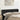 Hoofdbord met randen 147x23x78/88 cm fluweel zwart