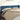 Hoofdbord met randen 203x16x78/88 cm fluweel donkerblauw