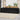 4-delige Loungeset met kussens poly rattan zwart