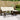 Tuinbank met tafel en kussens L-vormig poly rattan bruin