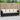 Ligbed met kussens poly rattan zwart
