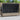 Ligbed met luifel en kussens poly rattan lichtgrijs