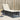 Ligbed met kussen poly rattan zwart
